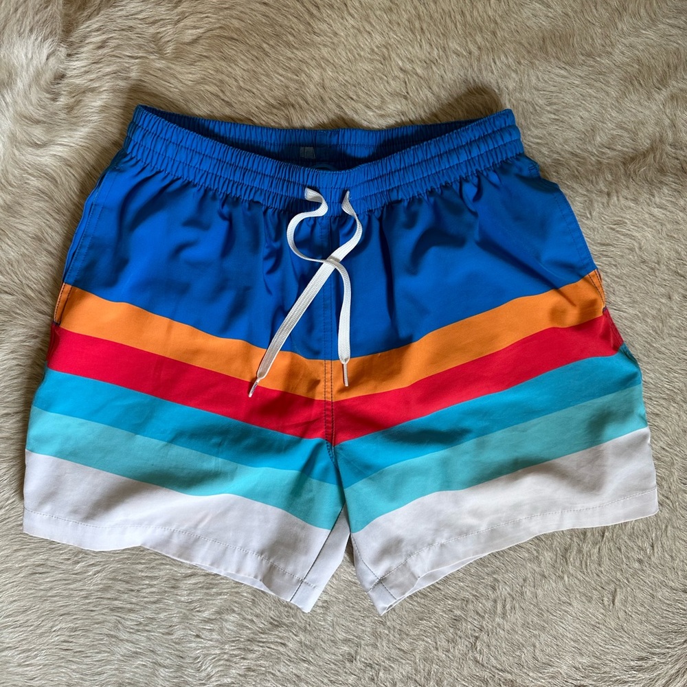Chubbies swim trunks in a size medium, blue, orange, red, white stripes.